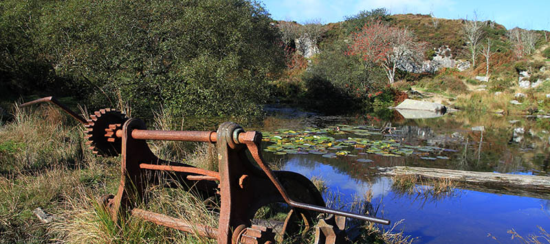 Old winch next to quarry pool