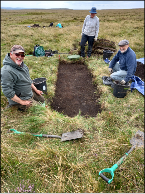 Three people carrying out an excavation